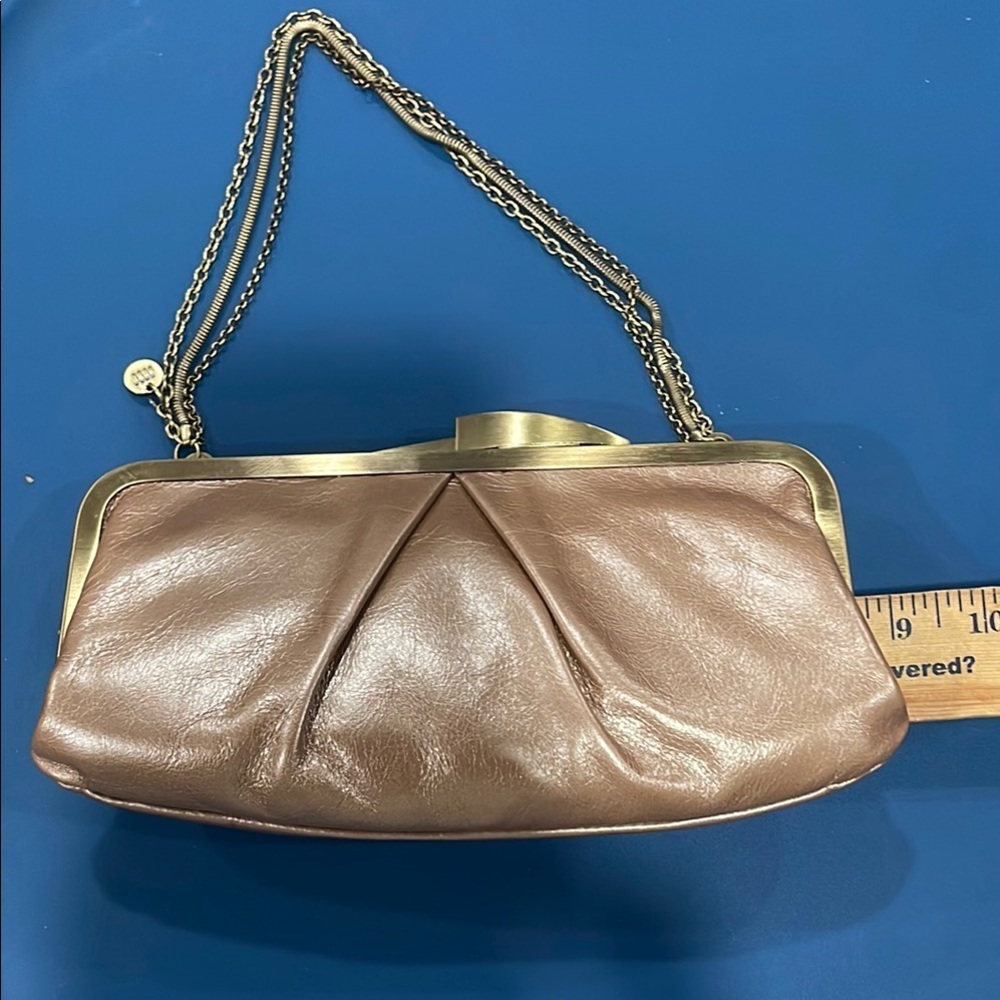 Hobo HALEY NWT Beautiful clutch   rose gold tone measurement are in photos.